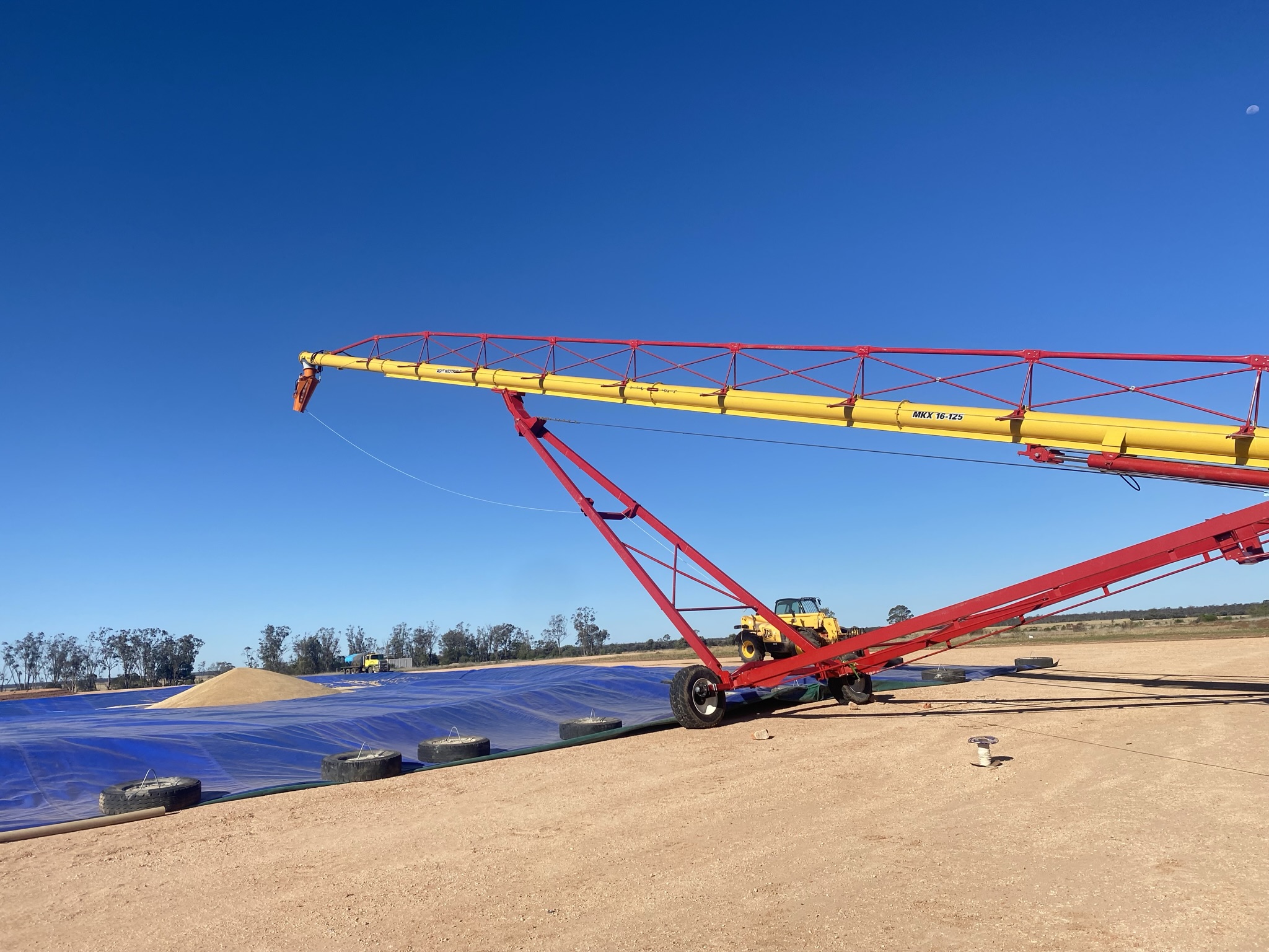 AGI Westfield grain auger in field